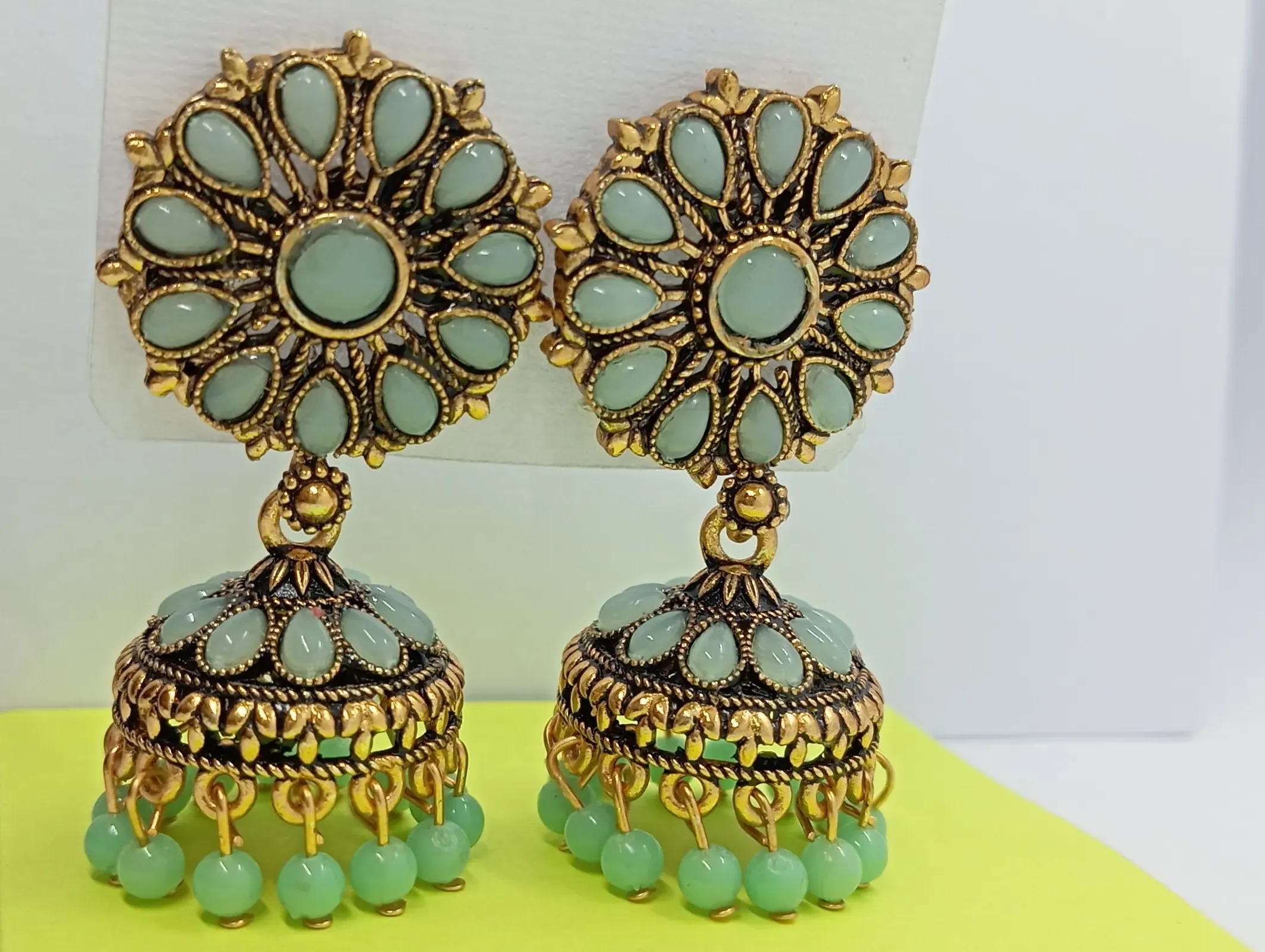 Antique Gold Round Floral Jhumka Earrings with Mint Green Beads for Women