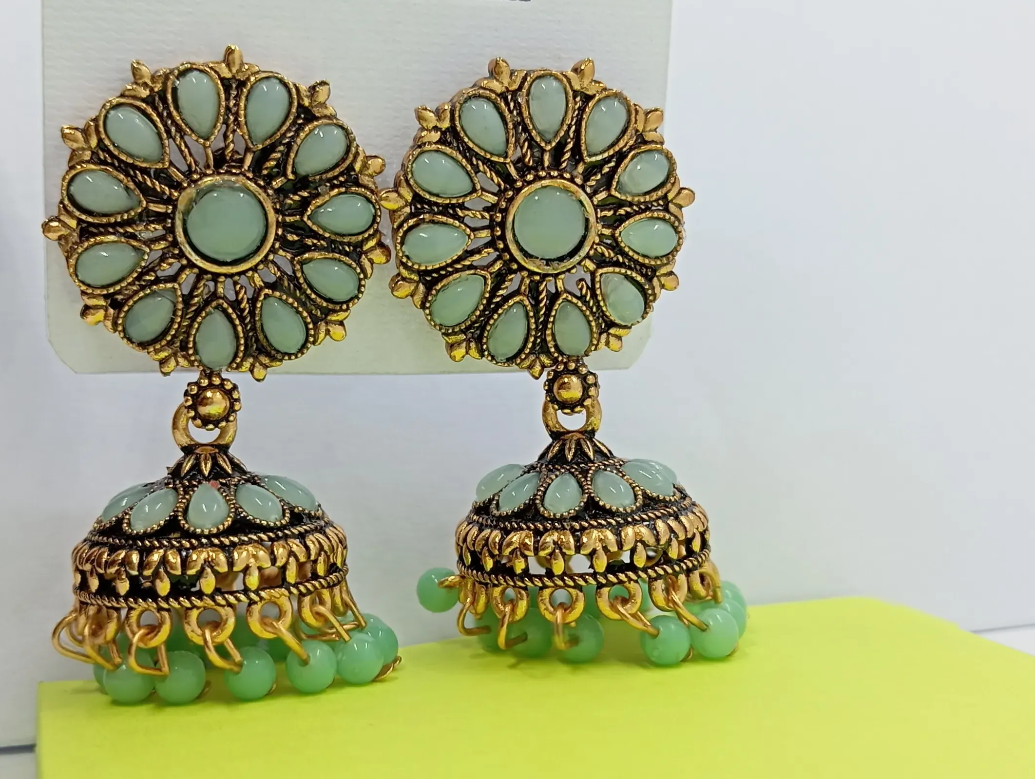 Antique Gold Round Floral Jhumka Earrings with Mint Green Beads for Women