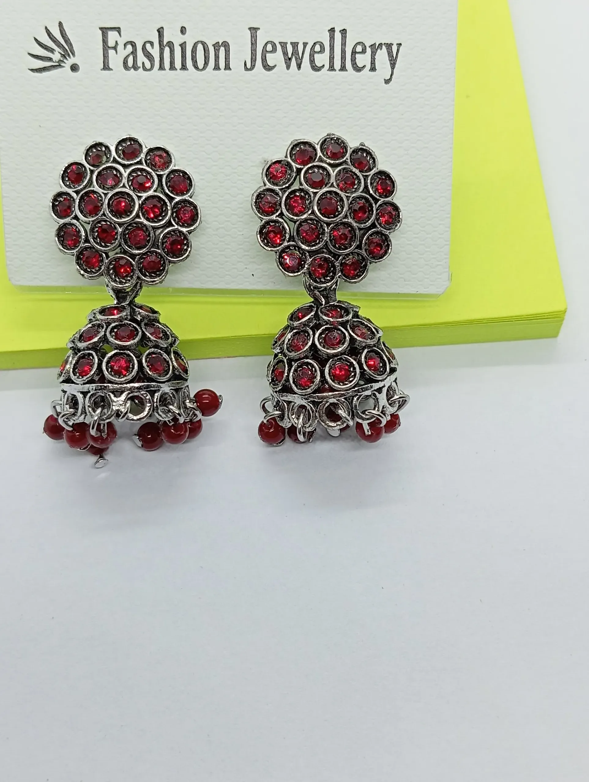 Red Stone Silver Jhumka Earrings with Studded Floral Top