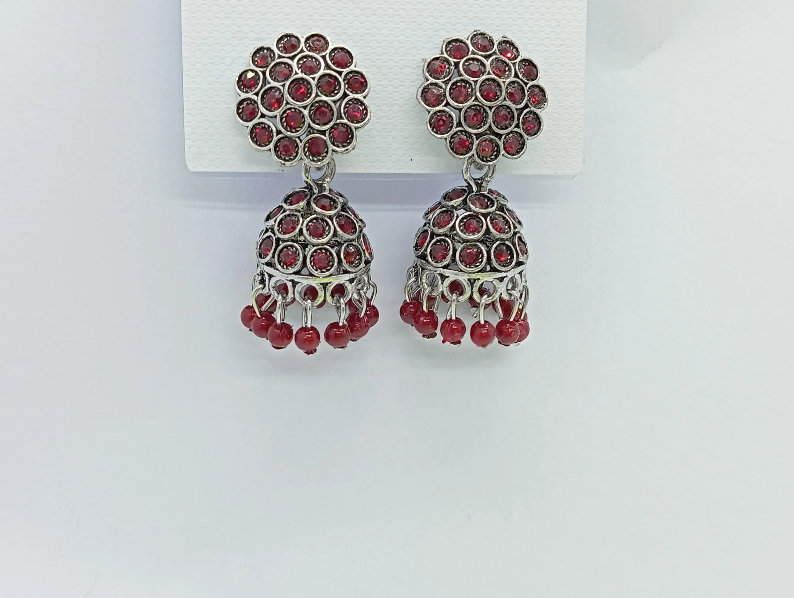 Red Stone Silver Jhumka Earrings with Studded Floral Top