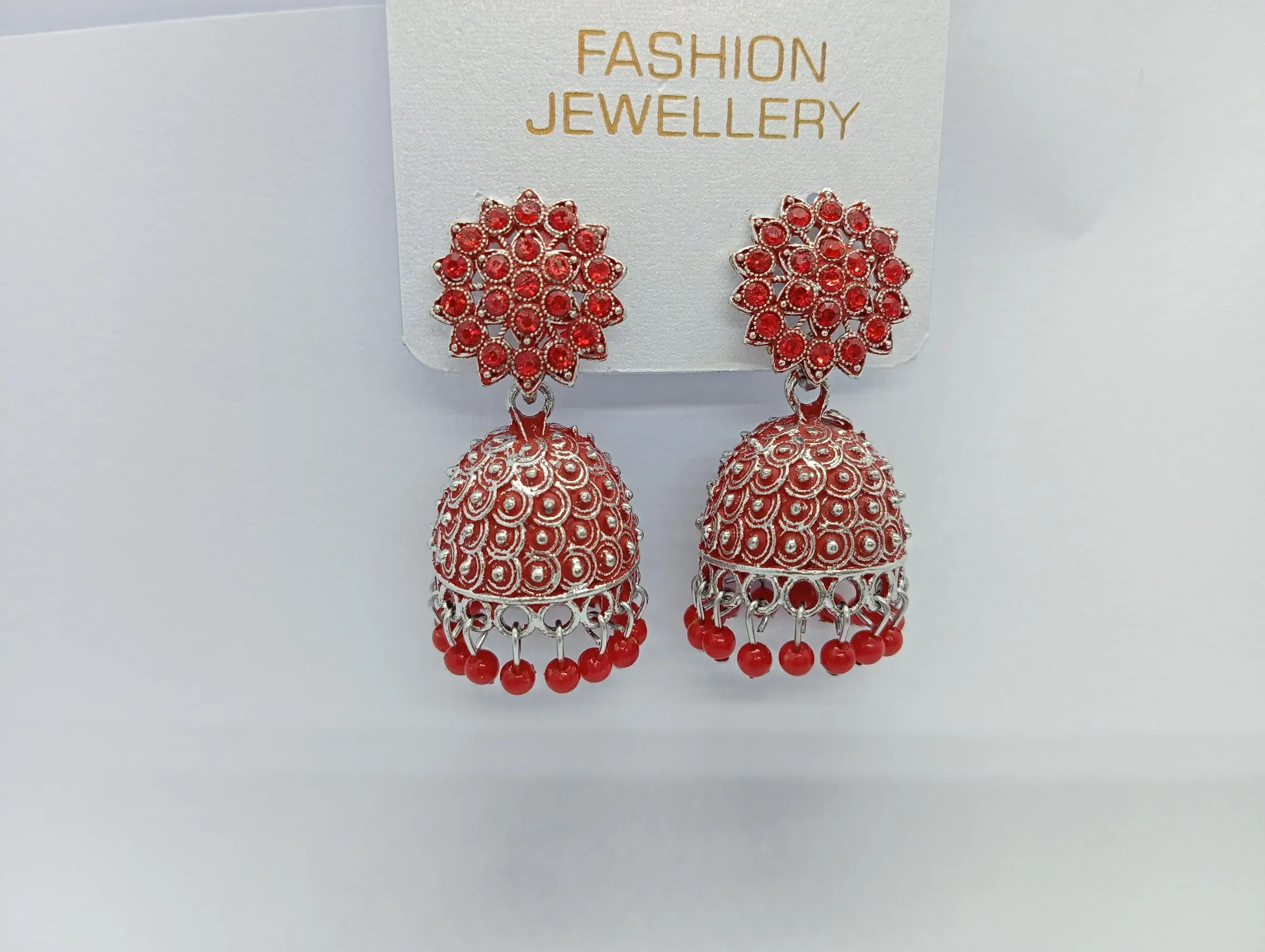 Red Dome Jhumka Earrings with Floral Stud Design