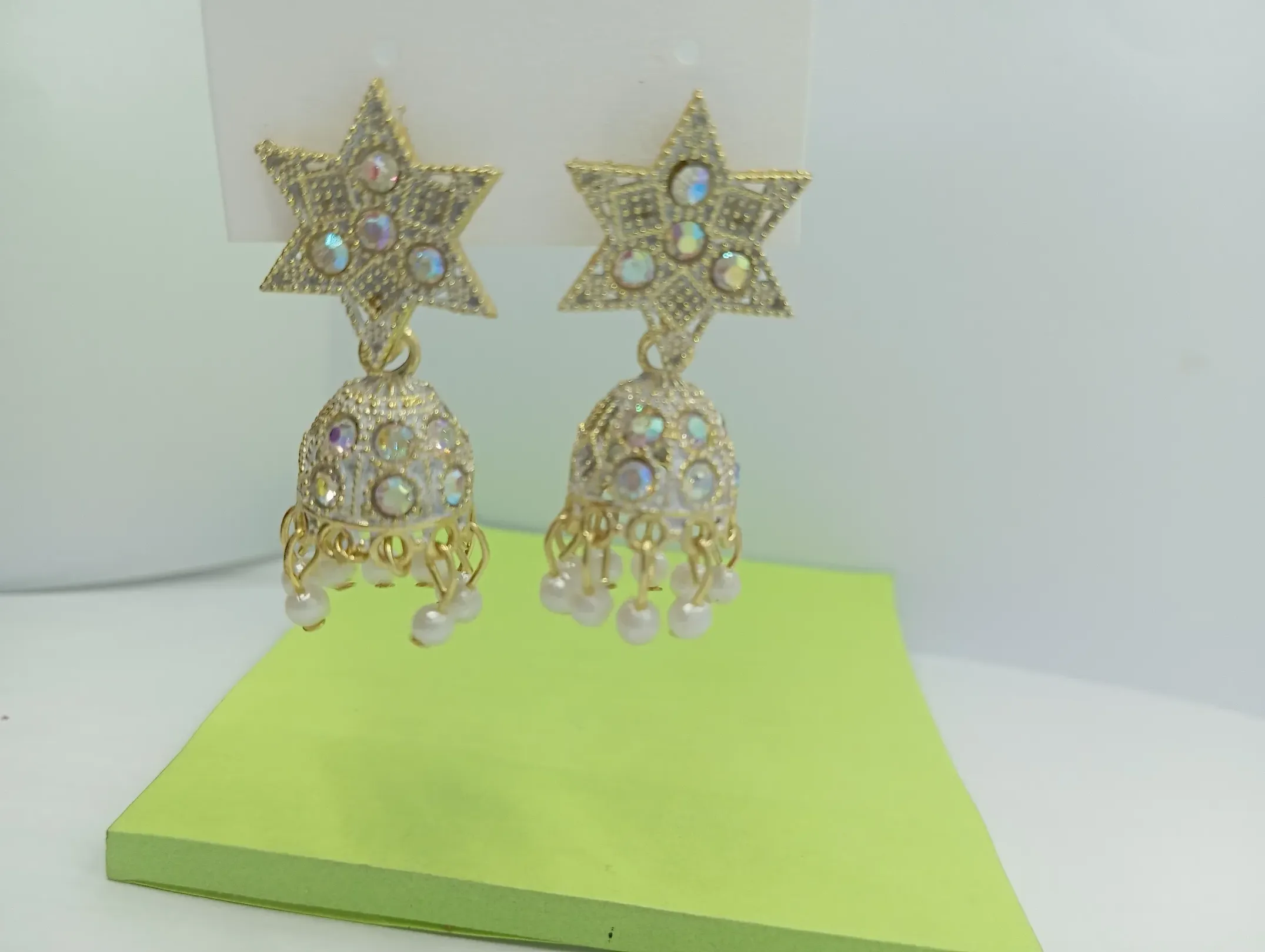 Golden Star Top Jhumka Earrings with White Pearl Drops