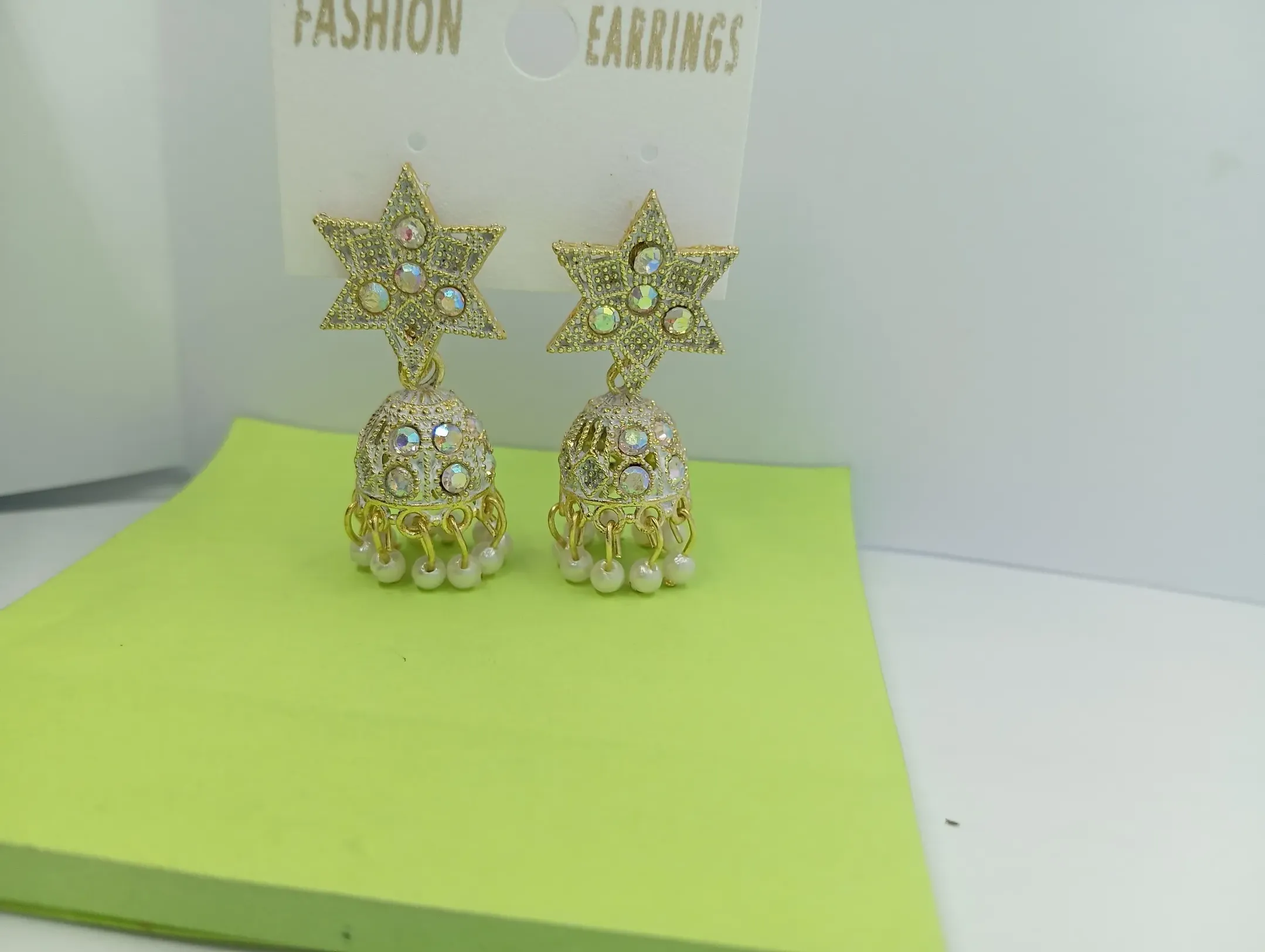 Golden Star Top Jhumka Earrings with White Pearl Drops
