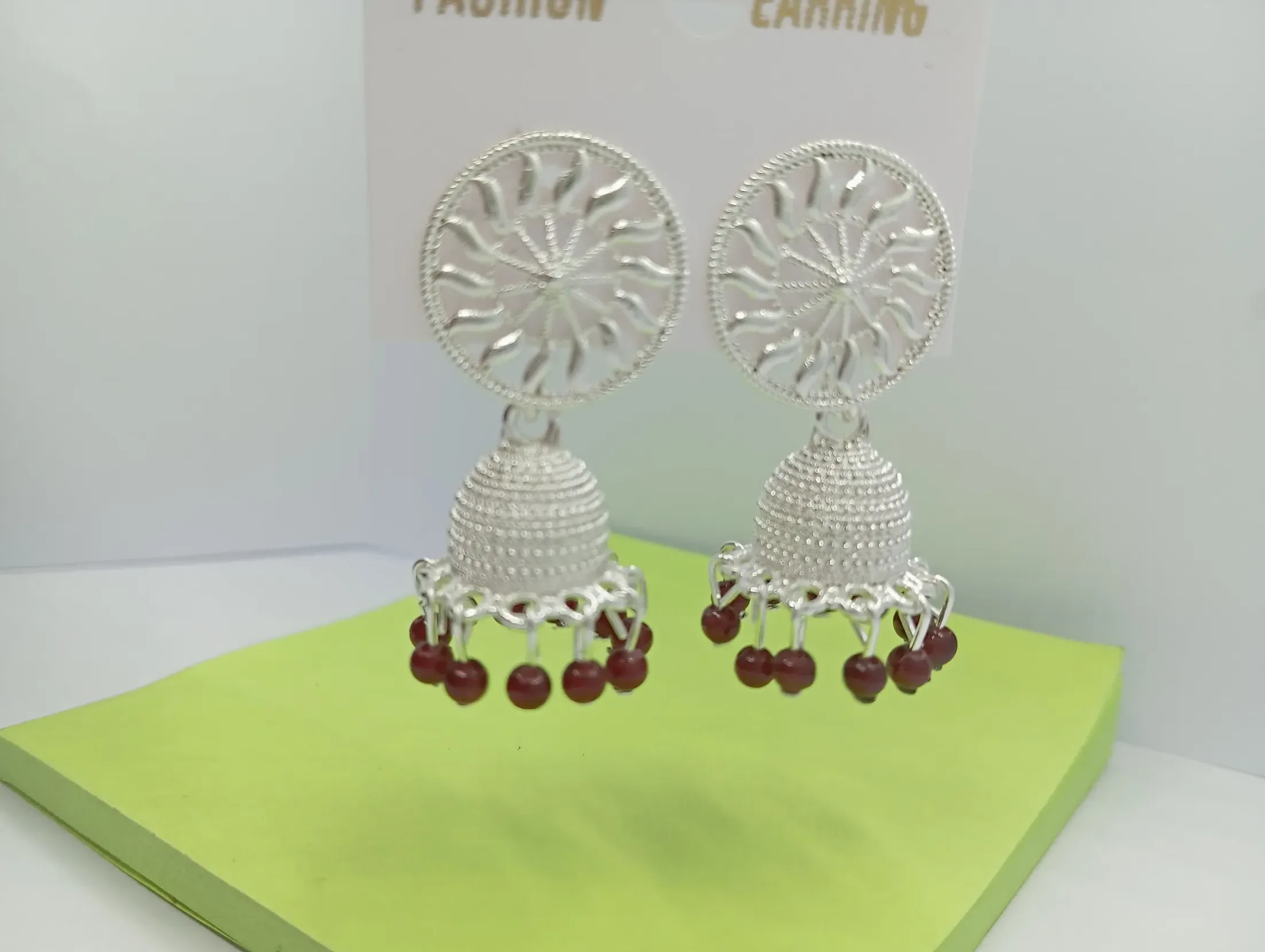 Silver Chakra Jhumka Earrings with Maroon Beads