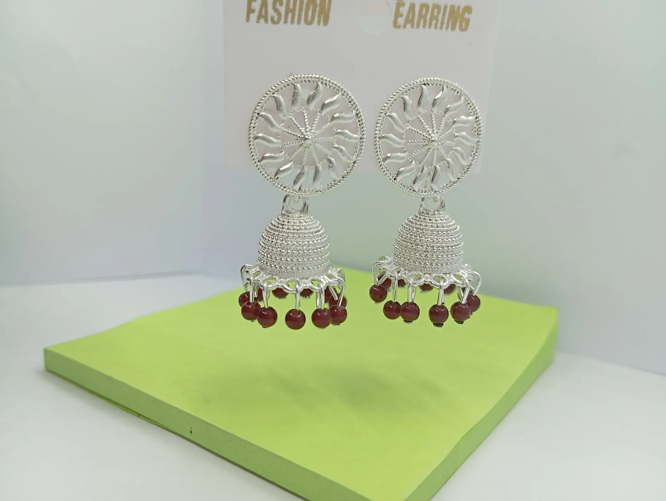 Silver Chakra Jhumka Earrings with Maroon Beads
