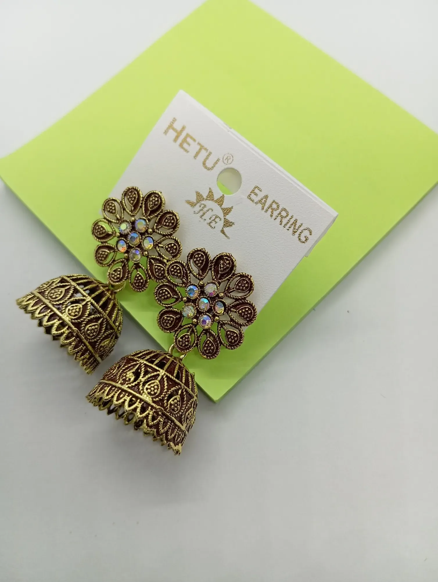 Floral Antique Gold Jhumka Earrings with Stone Studs