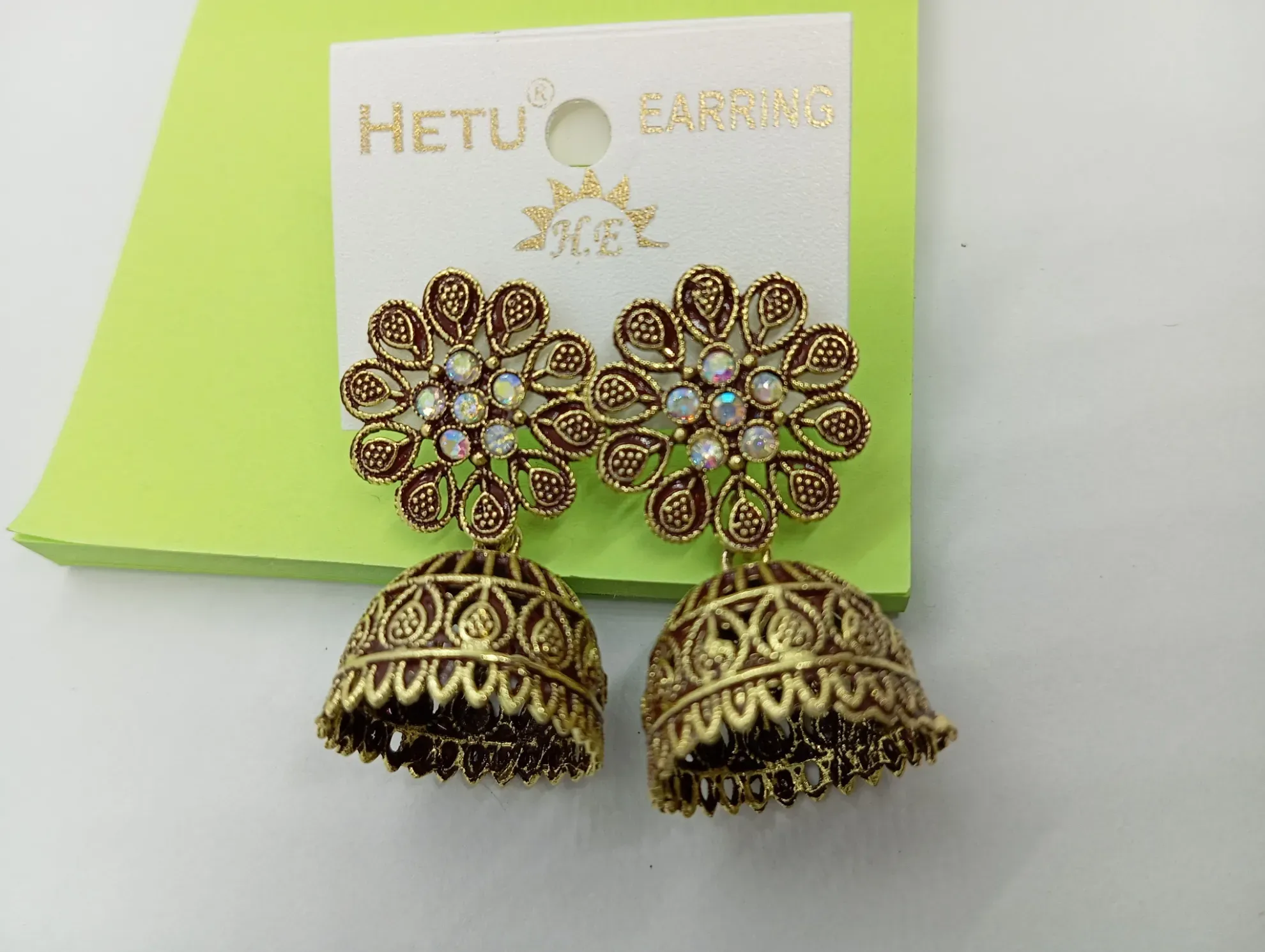 Floral Antique Gold Jhumka Earrings with Stone Studs