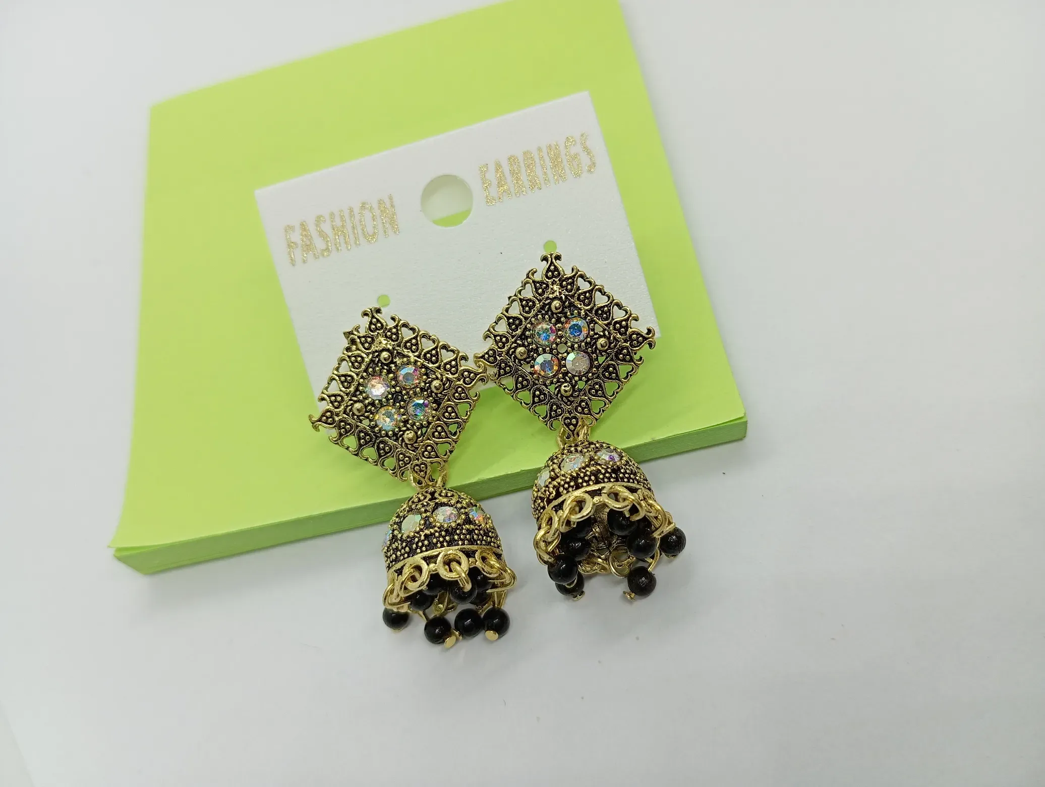 Antique Gold Jhumka Earrings with Black Beads