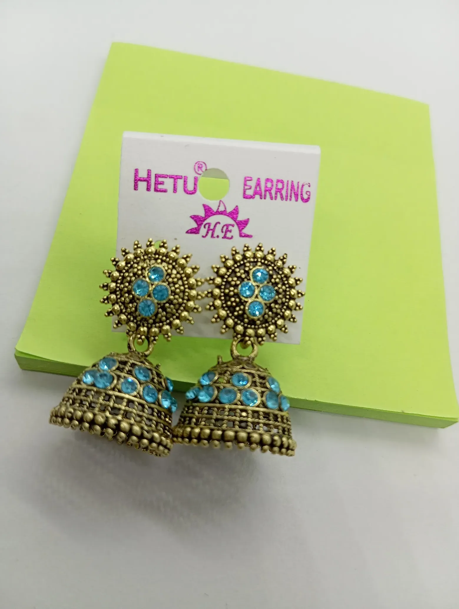 Antique Gold Jhumka Earrings with Blue Stone Work