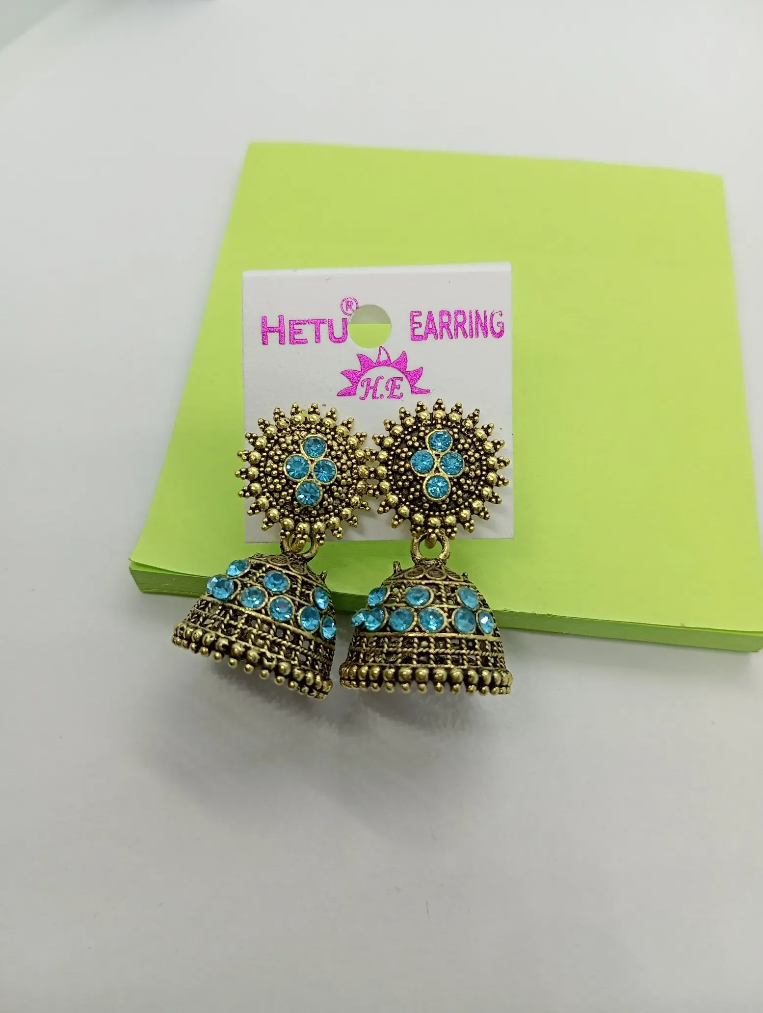 Antique Gold Jhumka Earrings with Blue Stone Work
